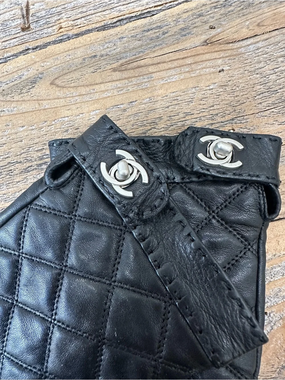 CHANEL Black Quilted Fingerless Leather Gloves with CC Snap